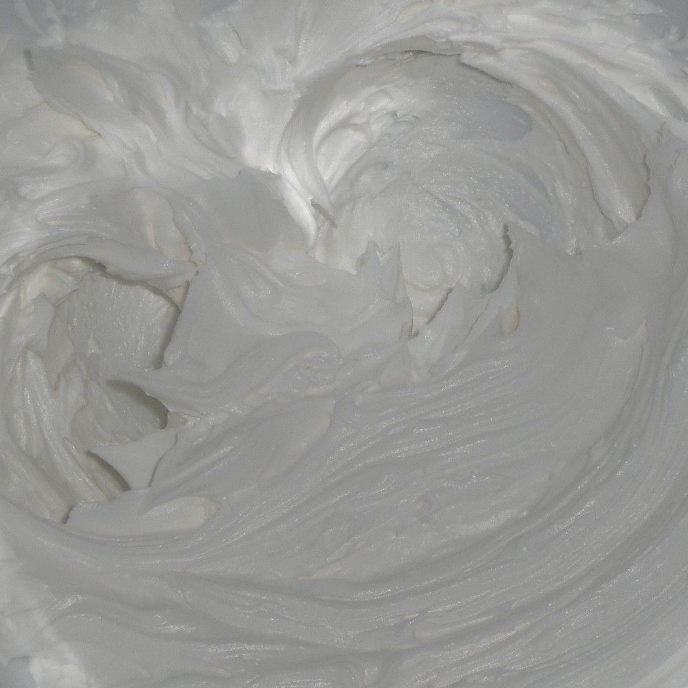 Cream texture jar representing the Gentle Exfoliating Cleanser
